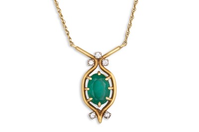 Lot 42 - AN EMERALD AND DIAMOND PENDANT, the oval cut...