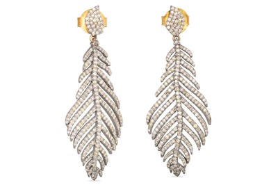 Lot 7 - A PAIR OF DIAMOND SET DROP EARRINGS, modelled...