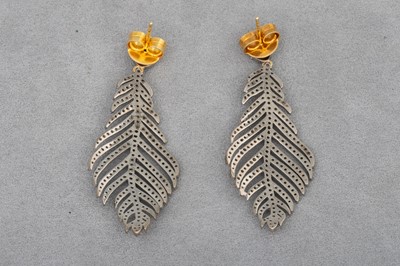 Lot 7 - A PAIR OF DIAMOND SET DROP EARRINGS, modelled...