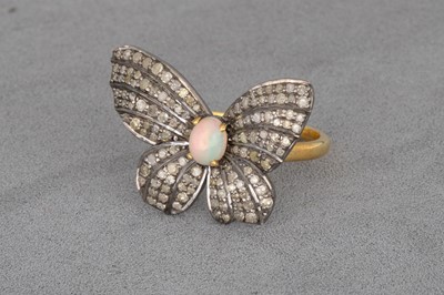 Lot 18 - AN OPAL AND DIAMOND RING, modelled as a...
