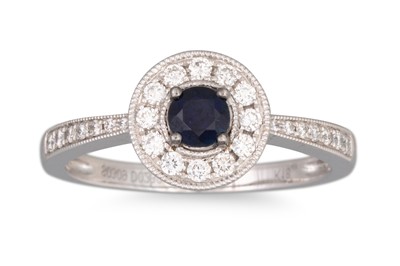 Lot 43 - A SAPPHIRE AND DIAMOND CLUSTER RING, mounted...
