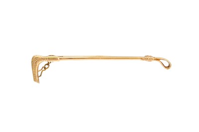 Lot 313 - AN ANTIQUE BROOCH, modelled as a riding crop...