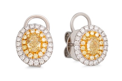 Lot 181 - A PAIR OF YELLOW DIAMOND CLUSTER EARRINGS, of...