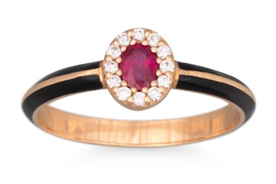Lot 189 - A RUBY AND DIAMOND CLUSTER RING, with black...