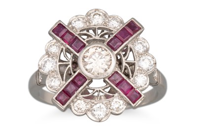 Lot 141 - A RUBY AND DIAMOND RING, of circular plaque...
