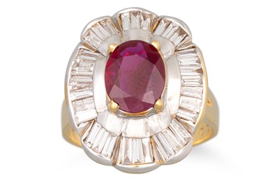 Lot 145 - A RUBY AND DIAMOND CLUSTER RING, the oval ruby...