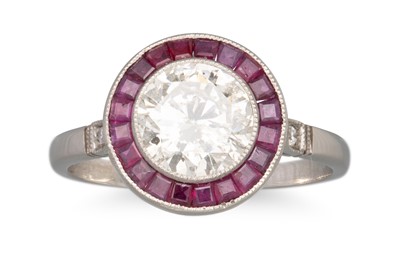 Lot 158 - A RUBY AND DIAMOND TARGET CLUSTER RING,...