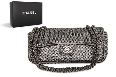Lot 247 - A CHANEL SILVER SEQUINED CLASSIC FLAP BAG,...