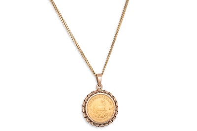Lot 45 - A 1/10 KRUGERRAND COIN, in gold mount, on a...