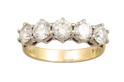 Lot 323 - A FIVE STONE DIAMOND RING, the brilliant cut...