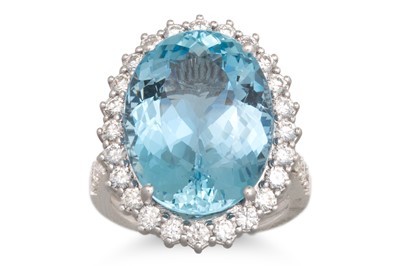 Lot 300 - AN AQUAMARINE AND DIAMOND RING, the oval...