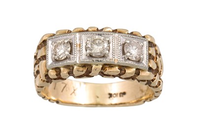 Lot 330 - A VINTAGE THREE STONE RING, mounted in 10ct...