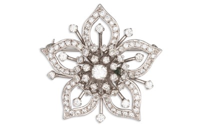 Lot 401 - A DIAMOND SET BROOCH, of circular floral form,...