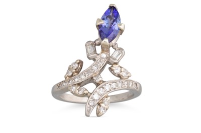 Lot 209 - A MARQUISE SHAPED TANZANITE DRESS RING, to...