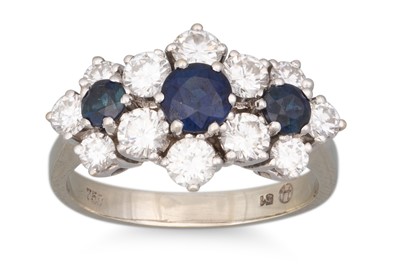 Lot 172 - A DIAMOND AND SAPPHIRE TRIPLE CLUSTER RING,...