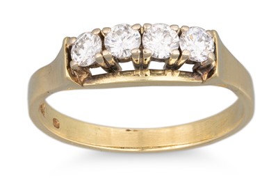 Lot 175 - A FOUR STONE DIAMOND RING, brilliant cut...