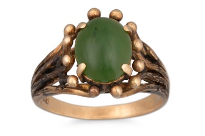 Lot 26 - A VINTAGE JADE RING, mounted in 18ct yellow...