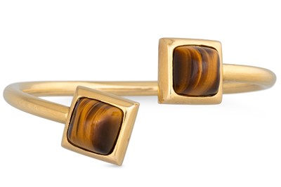 Lot 81 - AN UNUSUAL 1970's DESIGN BANGLE, of cross-over...