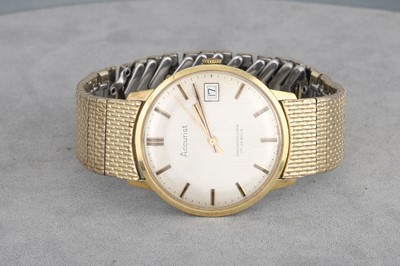 Lot 178 - AN 'ACCURIST' WRISTWATCH, with date and baton...