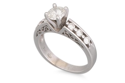 Lot 223 - A DIAMOND SOLITAIRE RING, mounted in 18ct...