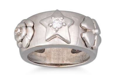 Lot 207 - A CHANEL CAMELIA , CLOVER AND STAR RING, set...