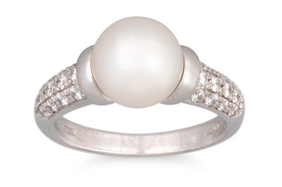 Lot 209 - A MIKIMOTO PEARL AND DIAMOND RING, the central...