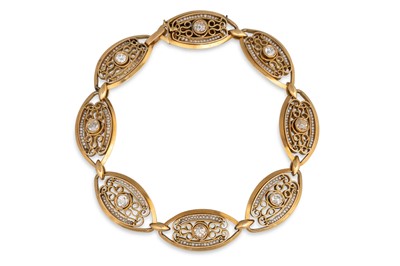 Lot 212 - AN 18CT GOLD BRACELET, each shaped wirework...