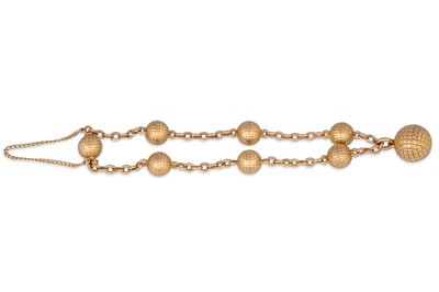 Lot 31 - A VINTAGE 9CT YELLOW GOLD BRACELET, spherical...