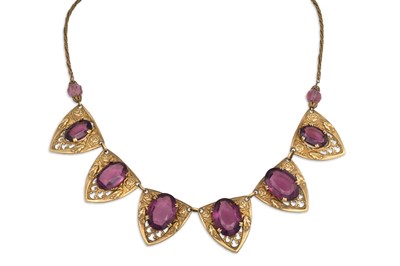 Lot 47 - A VINTAGE AMETHYST GLASS NECKLACE, with shaped...