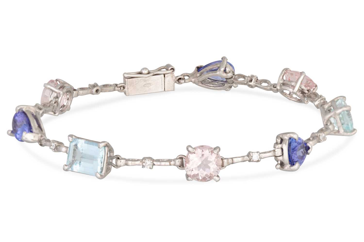 Lot 74 - A MULTI-GEM SET BRACELET, set with iolite,...