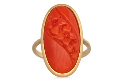 Lot 89 - A MEDITERRANEAN CORAL RING, carved decoration,...