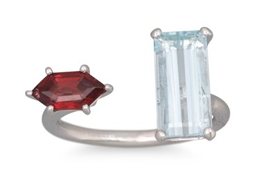 Lot 97 - AN AQUAMARINE AND GARNET TWO STONE RING, open...