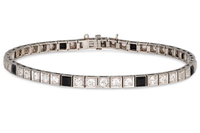 Lot 227 - A VINTAGE ONYX AND DIAMOND SET LINE BRACELET,...