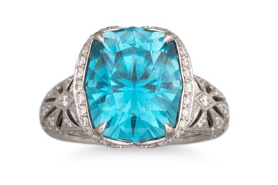 Lot 305 - A BLUE ZIRCON AND DIAMOND CLUSTER RING, by Kat...