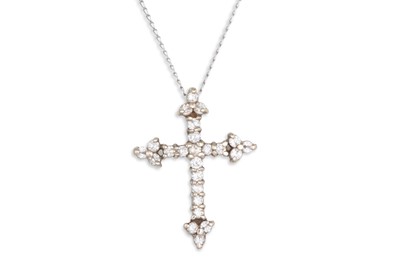 Lot 111 - A DIAMOND SET CROSS, mounted in white gold on...