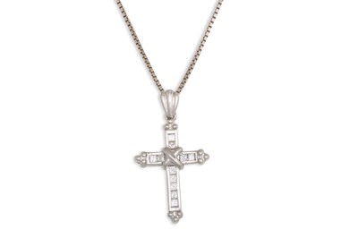 Lot 253 - A DIAMOND SET CROSS, princess cut diamonds...