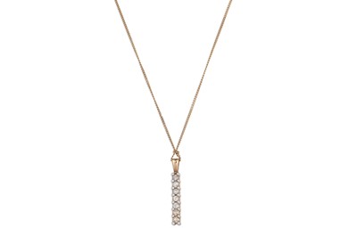 Lot 237 - A DIAMOND SET PENDANT, mounted in 9ct yellow...