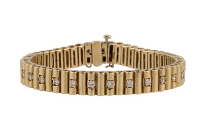 Lot 319 - A DIAMOND SET BRACELET, each alternate bar...