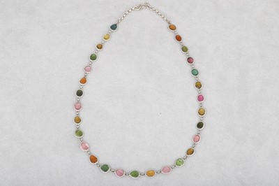Lot 64 - A MULTI-GEM SET NECKLACE, set in silver, set...