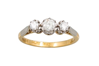 Lot 199 - A THREE STONE DIAMOND RING, the brilliant cut...