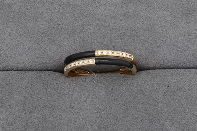 Lot 66 - A TWO ROWED ONYX AND DIAMOND RING, mounted in...