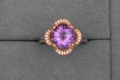 Lot 76 - AN AMETHYST AND DIAMOND CLUSTER RING, of...