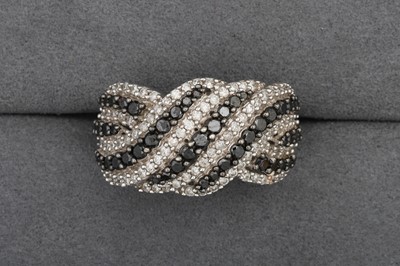 Lot 98 - A DIAMOND CLUSTER RING, multi-rowed, mounted...