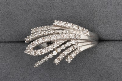 Lot 116 - A DIAMOND SPRAY CLUSTER RING, mounted in 14ct...