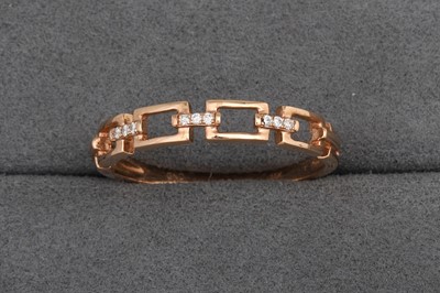 Lot 118 - A DIAMOND SET BAND RING, mounted in 10ct...