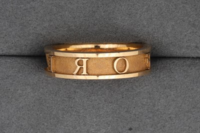 Lot 121 - AN 18CT YELLOW GOLD "FOREVER" RING, set with a...