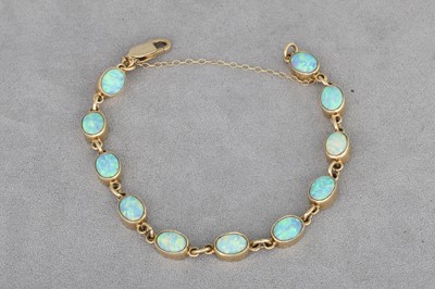 Lot 78 - A 9CT YELLOW GOLD SUITE OF SYNTHETIC OPAL...