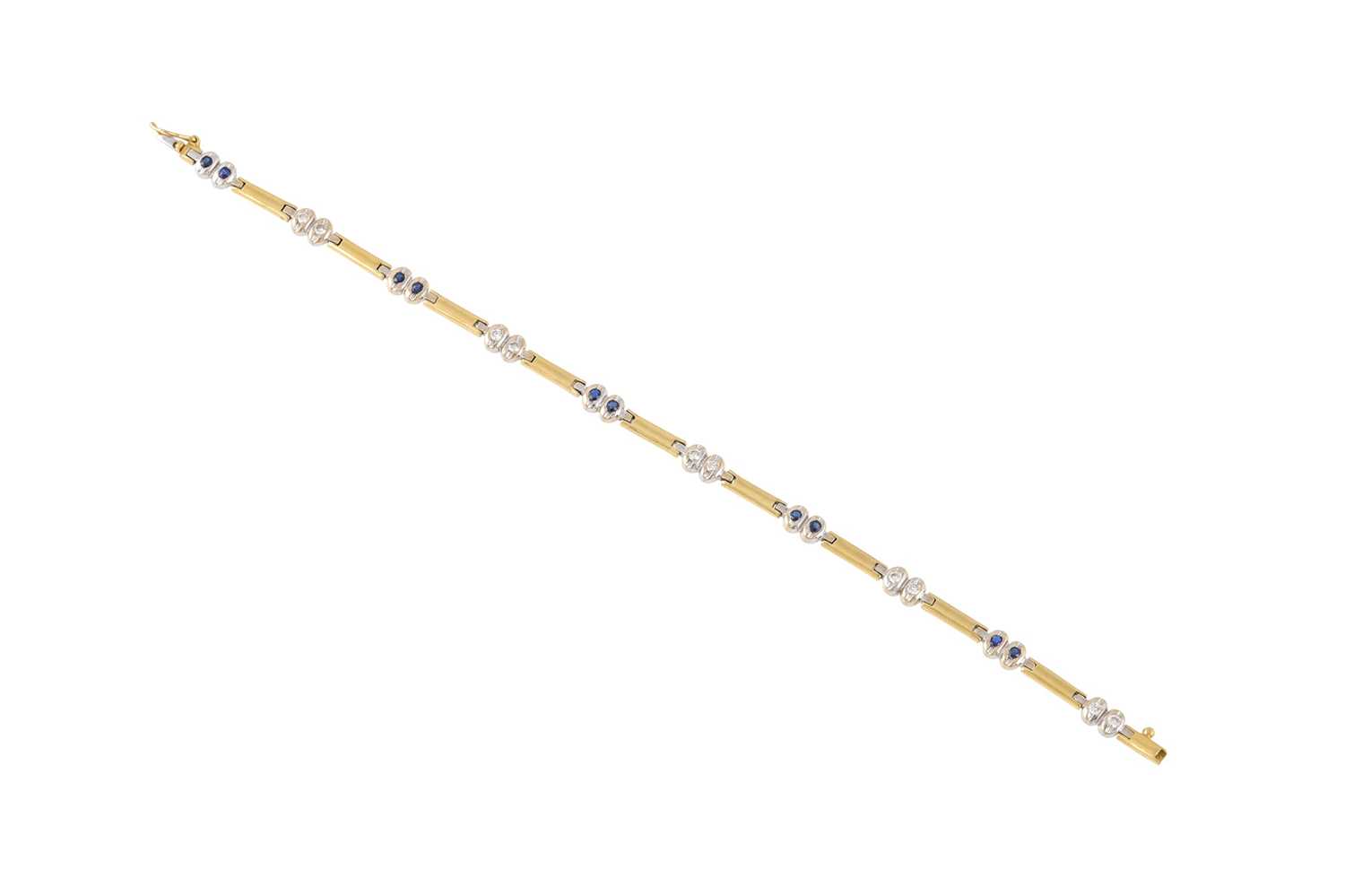 Lot 10 - A DIAMOND AND SAPPHIRE BRACELET, the...