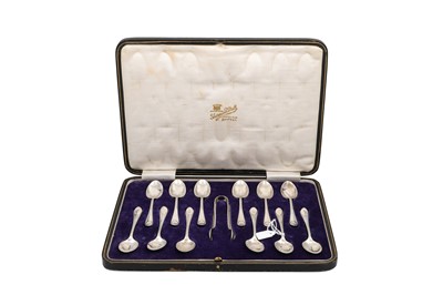 Lot 548 - A GEORGE V SET OF TWELVE SILVER TEA/COFFEE...