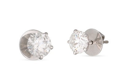 Lot 338 - A PAIR OF DIAMOND SOLITAIRE EARRINGS, by Wempe,...
